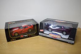 Two 1:18 scale die-casts, ERTL American Muscle 1996 Firebird Trans Am and Burago 3075 1997 Dodge