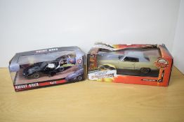 Two modern die-casts, RC2 The Fast and the Furious 1970 Chevy Monte Carlo and Jada Knight Rider KITT