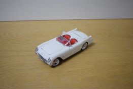A 1989 Franklin Mint 1:24 scale Die-cast, 1953 Corvette with tag and Letter, in polystyrene