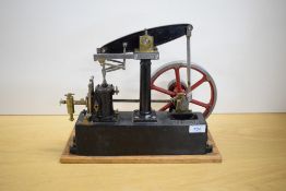 A Stuart Turner Live Steam Beam Engine having spoked flywheel, metal base numbered 80063, length