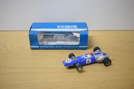 A Rovex Scalextric Car, C14A Matra GP in blue with racing number 4, driver wearing red helmet, in