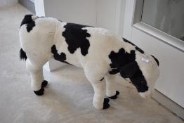 A modern DPL Leeds LTD Black and White Calf Soft Toy, height 55cm, length 80cm