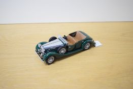 A 1989 Franklin Mint 1:24 scale Die-cast, 1938 Alvis 4.3 Litre with tag, in polystyrene packing