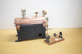 A Live Steam horizontal Copper Boiler having H F Vulcanizer gauge on metal stand, overall length