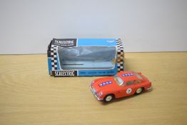 A Mini Models Tri-ang Scalextric Car, C68 Aston Martin DB4 GT in red with racing number 7 and