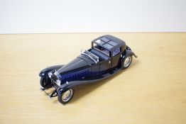 A 1989 Franklin Mint 1:24 scale Die-cast, 1930 Bugatti Royale Coupe Napoleon with tag and Letter, in