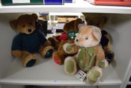 Four Harrods Year Teddy Bears, 1995 wearing green tie with tag, 1997 wearing red tie with tag,