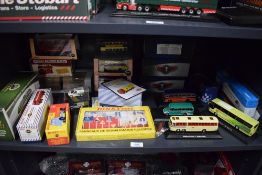 A shelf of modern die-casts including Atlas Dinky 435 Bedford TK Tipper, Heinz Guy Warrior Van,