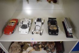 Four 1:18 scale die-cast, Burago 1961 Jaguar E Type, 1928 Mercedes Benz SSK, Tonka Polistil