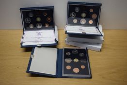 Six Royal Mint United Kingdom Proof Coin Sets, 1983 x3 and 1984 x3, all in display and folding
