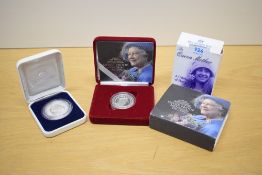 Two 2002 Queen Mother Memorial Silver Coins, Royal Mint Proof Five Pound, weight 28.5g and Royal