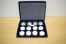 Twelve Royal Mint 2003 Queen Elizabeth II Solomon Islands 25 Dollar Silver Proof Coins, History of