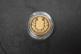 A Royal Mint 2002 Queen Elizabeth II Gold Proof Sovereign, Crowned Shield of the Royal Arms, in