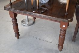 A 19th Century mahogany windout dining table (af no centre leaf)