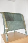 A vintage Lloyd Loom tub chair