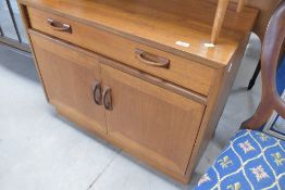 A vintage teak G plan cabinet, comprising single drawer over cupboard, approx width. 84cm