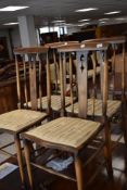 A set of four early to mid 20th Century Edwardian style salon chairs