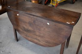 A 19th Century mahogany gateleg dining table