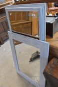 Two modern wall mirrors