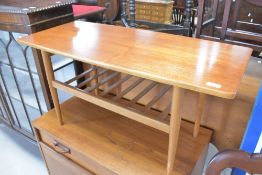 A 1970s teak coffee table having railed undertier, approx. 91 x 40cm