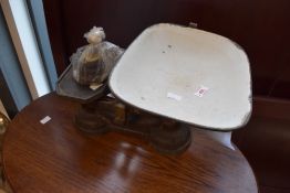A set of vintage cast iron balance scales