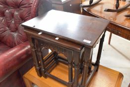 A modern oak nest of three tables