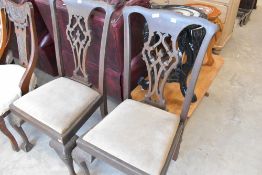 A set of four Victorian salon/dining chairs having overstuffed seats, upholstery project