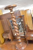 A reproduction twist column torchere, height approx. 92cm