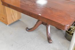 A 19th Century mahogany breakfast/dining table in the Gillows style having tilt top, with