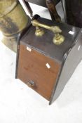 A Victorian mahogany coal purdonium