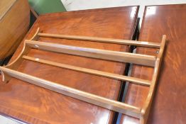 An Ercol wall shelf, width approx. 97cm