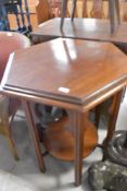 A mahogany occasional table in the Libertys style having octagonal top, circular undertier and