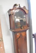 An 18th Century oak and mahogany long cased clock , having brass and silvered dial, named for