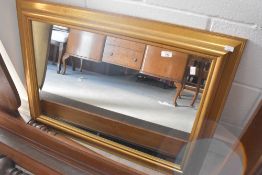 A modern gilt frame wall mirror, approx. 91 x 68cm
