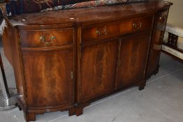 A reproduction Regency break front sideboard of slim proportions, width approx. 168cm