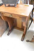 A Gothic style oak desk of small proportions