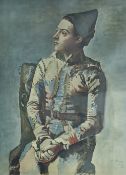 After Pablo Picasso (Spanish 1881-1973) colour print, 'Seated Harlequin 1923', signed and dated in