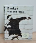 After Banksy (unknown) a group of three unframed canvas prints of the artists iconic works and