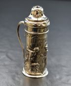 An Edwardian silver caster, of cylindrical form having a pierced top, embossed ancient Grecian