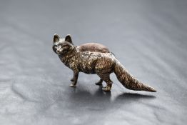 An Edwardian silver novelty pin cushion, modelled as a fox having dark fabric to the body, marks for