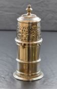A Victorian silver sugar caster, of cylindrical form having a pierced, finial topped cover over