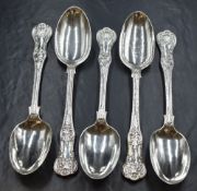 A group of five Victorian silver Queen's pattern serving spoons, having a horse heraldic crest to