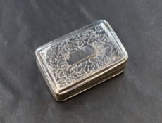 A Georgian silver vinaigrette, of hinged rectangular form, having decorative engraving to the