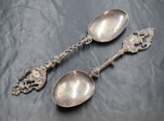 A pair of Dutch import 19th/20th century silver commemorative spoons, having ornate pierced