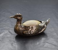 An Edwardian silver novelty pin cushion, modelled as a duck having light fabric to the body, marks