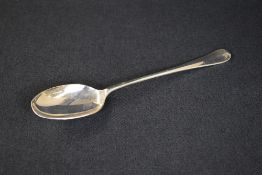 A large Elizabeth II silver Hanoverian rat-tail pattern serving spoon, having 'AEHH' to terminal