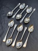 A group of five George V silver Old English pattern teaspoons, with engraved thread decoration,