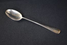 A large Elizabeth II silver Hanoverian rat-tail pattern serving spoon, having 'AEHH' to terminal