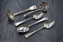 A group of three George III silver Old English pattern teaspoons, having initials and monograms to