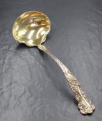 An American late 19th/early 20th century white metal Gorham Buttercup pattern ladle, having 'KJA'